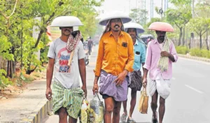 Labourers hiding there heads with gampa due to rising heat in hyderabad.